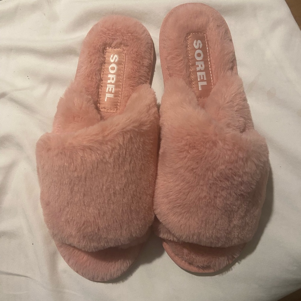 Sorel pink fluffy slides . Never worn sadly they are too small for me